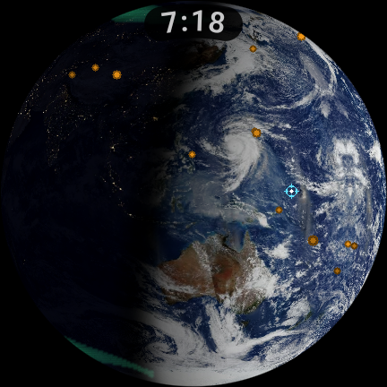 The watch globe over the Pacific and Australia: daylight on the right, city lights on the night side, a typhoon, earthquake markers and the ISS crosshair