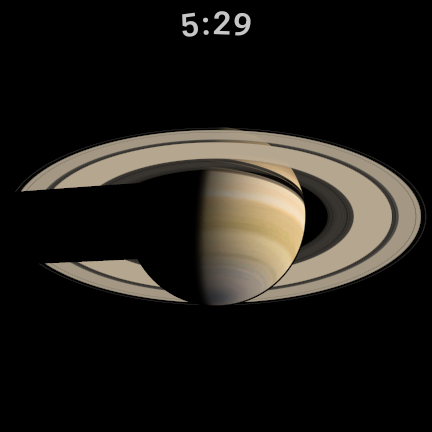 Saturn on the watch with its rings, the planet's shadow across the rings on the night side
